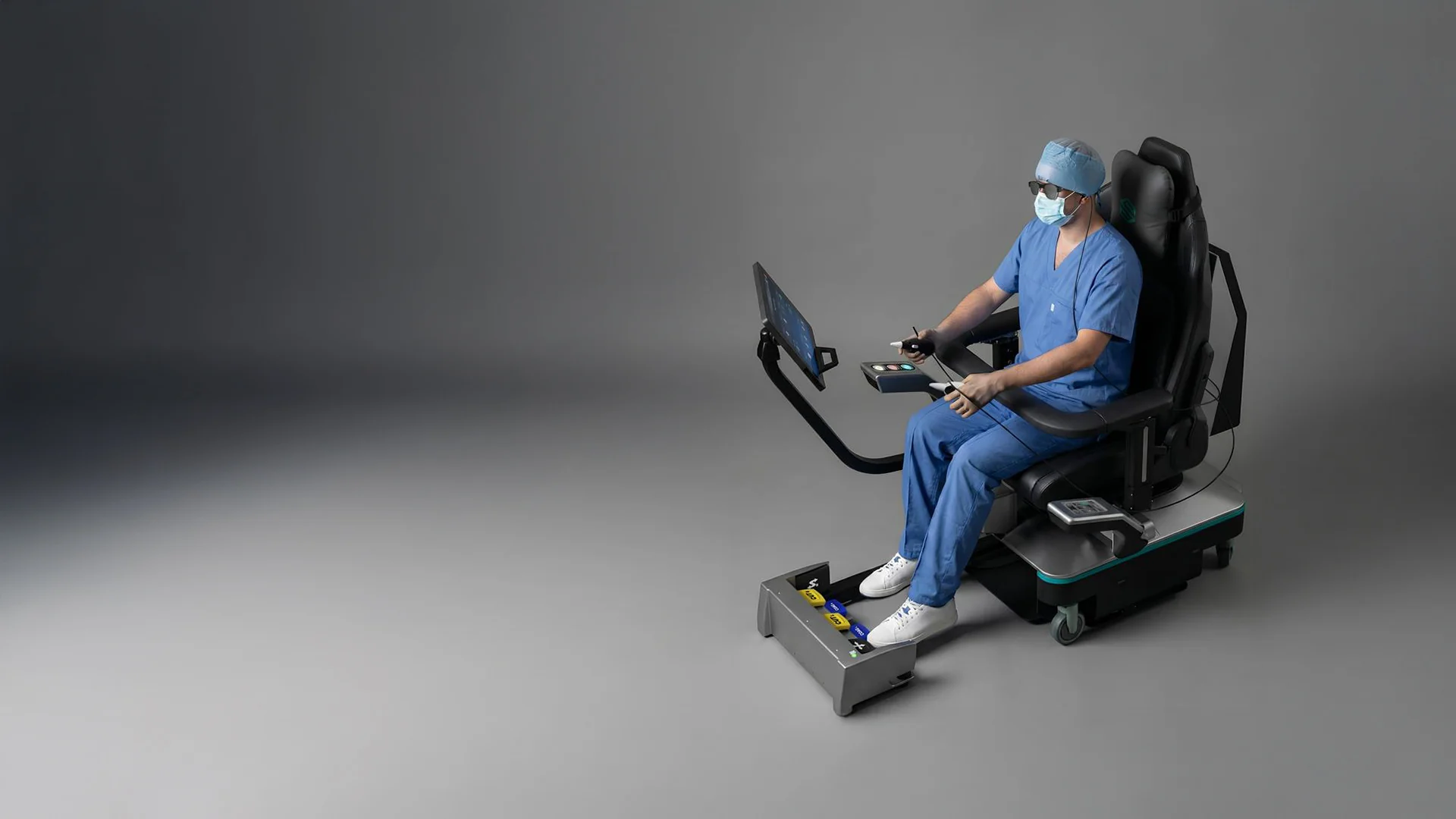A surgeon at the MantrAsana tele-surgeon console