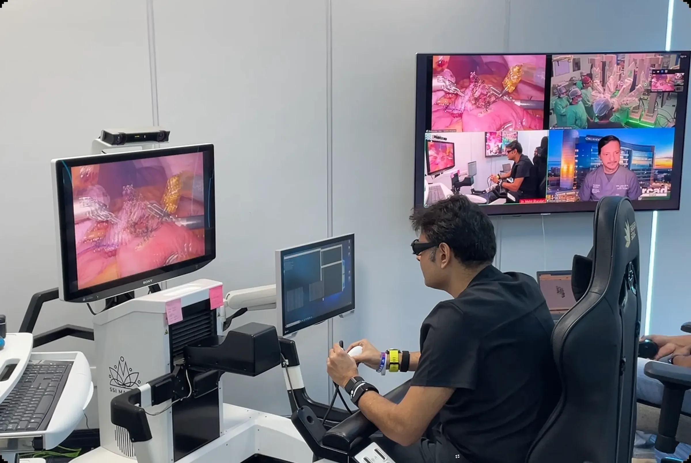 A surgeon at the SSi Mantra console with live video from the remote operating room